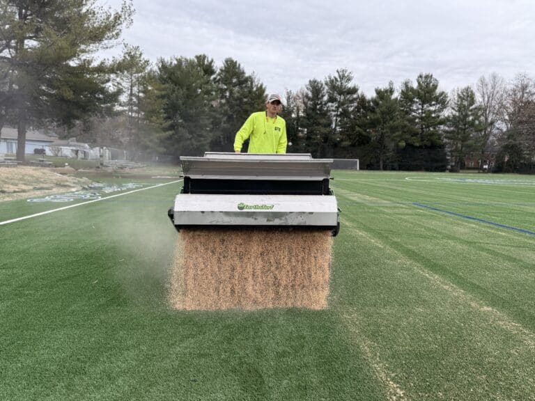 48 Brush Expeller on the 415 Multispread stand of top dresser
